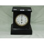 A Victorian Black Marble Encased Mantel Clock With Circular White Enamel Dial