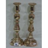 A Pair Of Square Based Brass Candle Holders