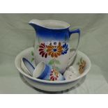 An Edwardian Pottery Floral Decorated Wash Jug And Basin Set