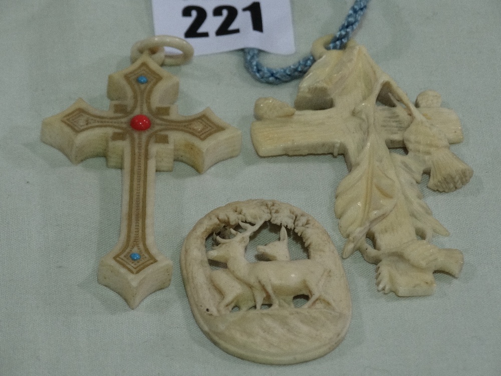 Three Carved Bone Pendants