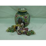 An Oriental Ginger Jar And Cover Together With A Pair Of Similar Decorated Figures