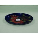 A Moorcroft Pottery Blue Ground Oval Dish, 9" Across