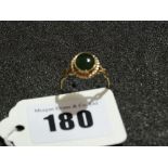 A 9 Carat Gold Jade Set Ring