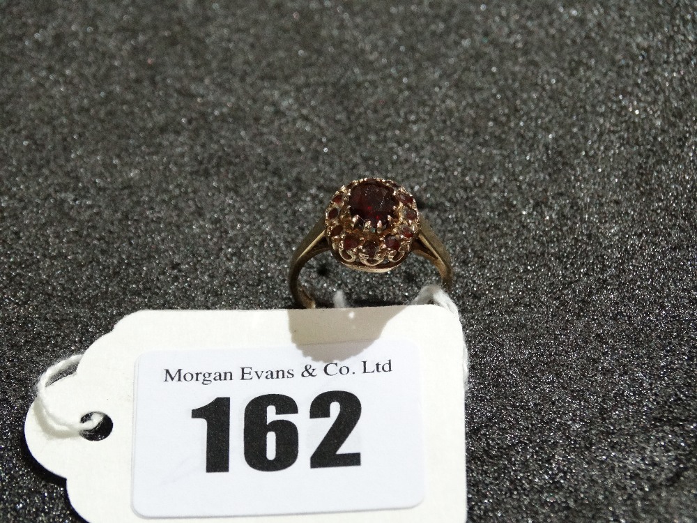 A Gold Garnet Cluster Ring