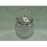 A Cut Glass Biscuit Jar With Plated Mounts