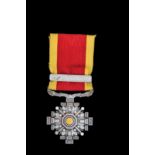 *Manchukuo, Order of the Pillars of State, Eighth Class breast badge, in silver and gilt, with