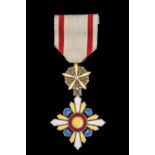 *Manchukuo, Order of the Auspicious Clouds, Fifth Class breast badge, in silver-gilt and enamels,