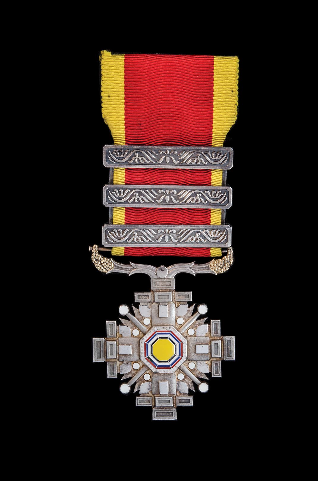 *Manchukuo, Order of the Pillars of State, Sixth Class breast badge, in silver and gilt, with