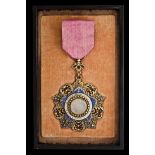 *China, Order of the Brilliant Jade, Ninth Class breast badge, in silver-gilt and blue enamel,