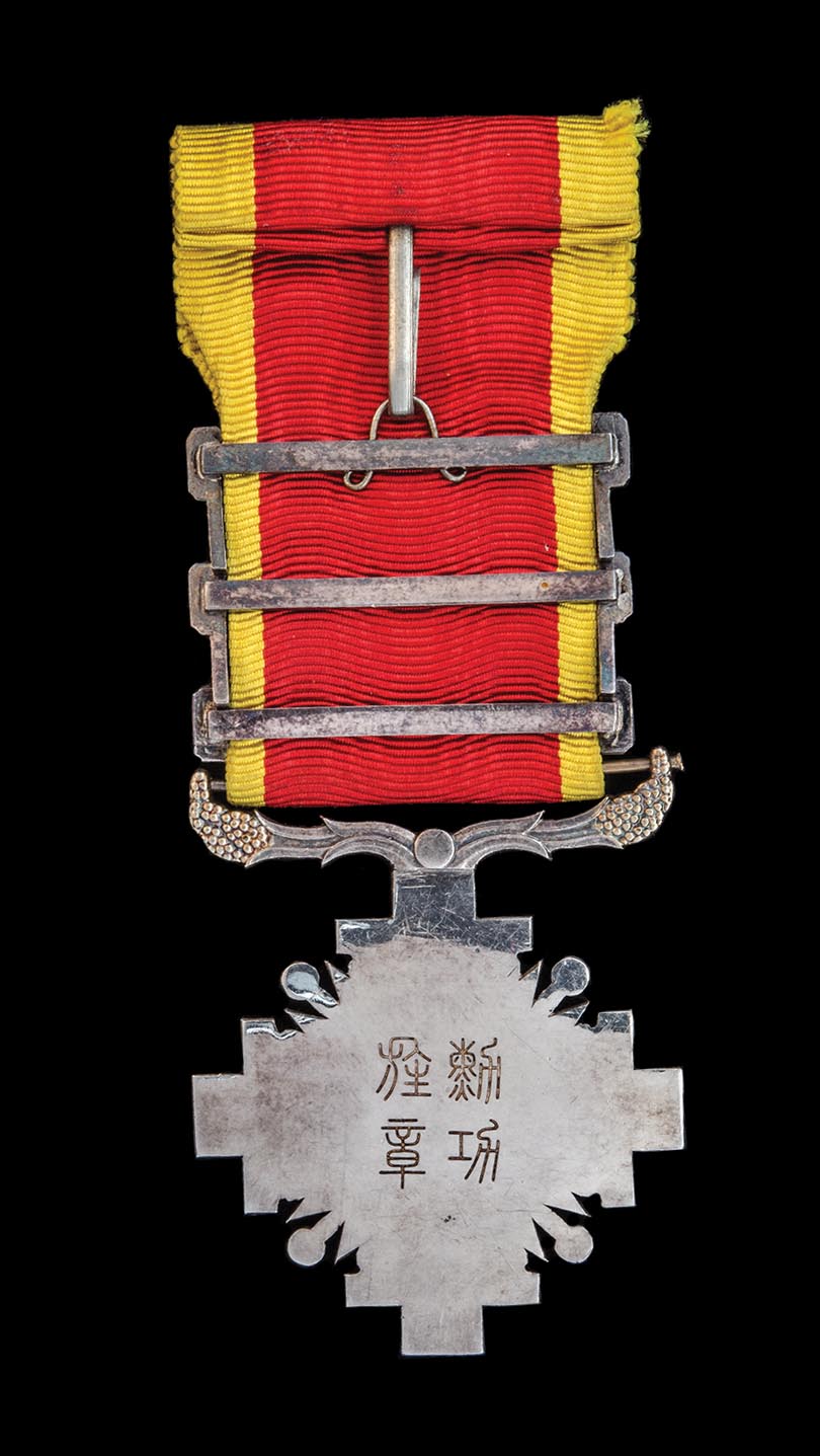 *Manchukuo, Order of the Pillars of State, Sixth Class breast badge, in silver and gilt, with - Image 2 of 2