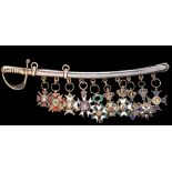 *Dress Miniatures: Russia, a miniature sword in silver and silver-gilt with pre-1898 84 zolotniki