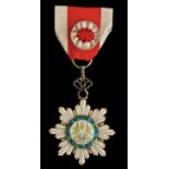 *China, Order of the Golden Grain, Fourth Class breast badge, in silver-gilt and enamels, width