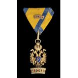 *Austria, Order of the Iron Crown, Knight’s breast badge, in bronze-gilt and enamels, unmarked; with