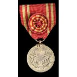 *Manchukuo, Red Cross Special Supporting Membership Medal, in bronze-gilt, 30.5mm, about extremely