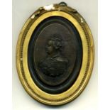 Anne, a uniface oval portrait medallion in translucent pressed horn, after Jean Obrisset but