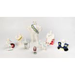 MICHELIN: A collection of ceramic Bibendum figurines (9 items).