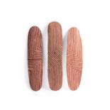 Three Wunda Shields Western Australia (early twentieth century) carved wood and natural earth