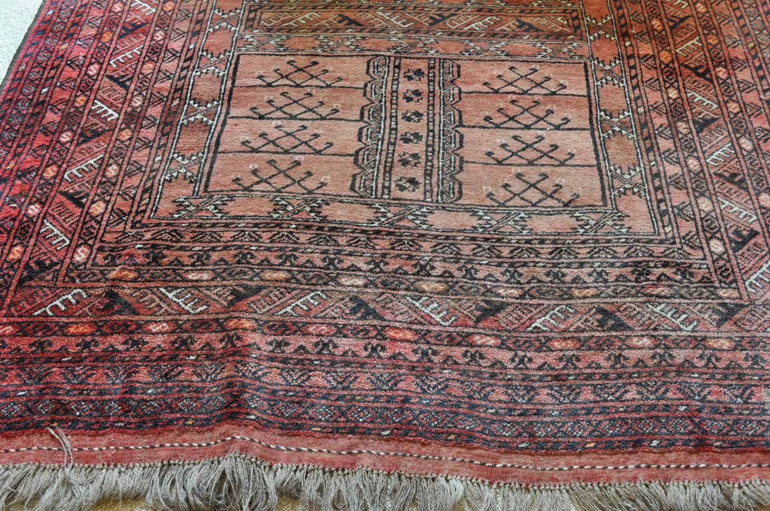 A tekke Turkoman 'engsi' rug, Afghanistan  A tekke Turkoman 'engsi',Afghanistan  218 x 166cm