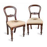 A set of ten cedar dining chairs, Australian, 19th centuryeach with hand embroidered tapestry seats