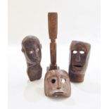 A collection of Indonesian carvings and masks, 20th century  A collection of Indonesian carvings and