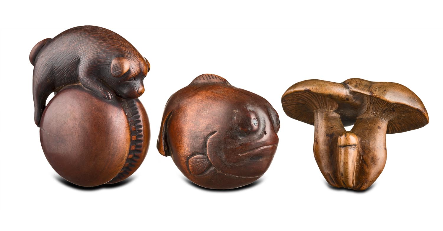 Three Japanese wood netsuke, 19th Century  Three Japanese wood netsuke, 19th Century  one in the