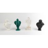 MICHELIN: A group of 4 Bibendum figures; one black solid rubber figure with engraved base circa