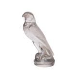 RENE LALIQUE: 'Faucon': a clear and slightly tinted glass car mascot depicting a standing falcon