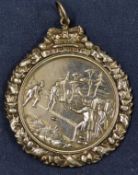 Royal Caledonian Curling Club medal illustrating a curling game by Sclater and on the reverse