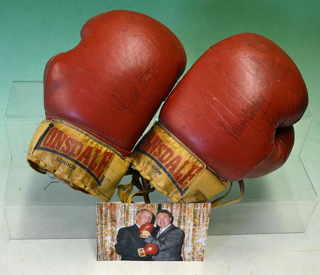 Rare pair of fight worn Henry Cooper boxing gloves signed by Cooper and Ali - comprising a red and - Image 2 of 2