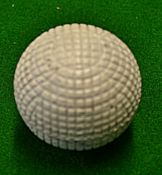 Original c1900 line mesh pattern rubber core golf ball - retaining 95% white paint finish but has