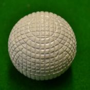 Original c1900 mint unused fine line mesh pattern rubber core golf ball - retaining 100% white paint