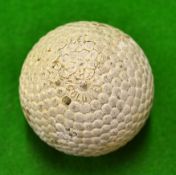 The Colonel bramble pattern rubber core golf ball showing the name to one pole and the patent number