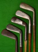 5x various smooth faced irons pre 1900 including Tom Stewart cleek and musselback mid iron^ an