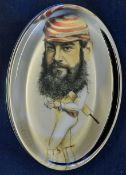 W G Grace modern cricket glass paperweight depicting a caricature colour print of W.G Grace within