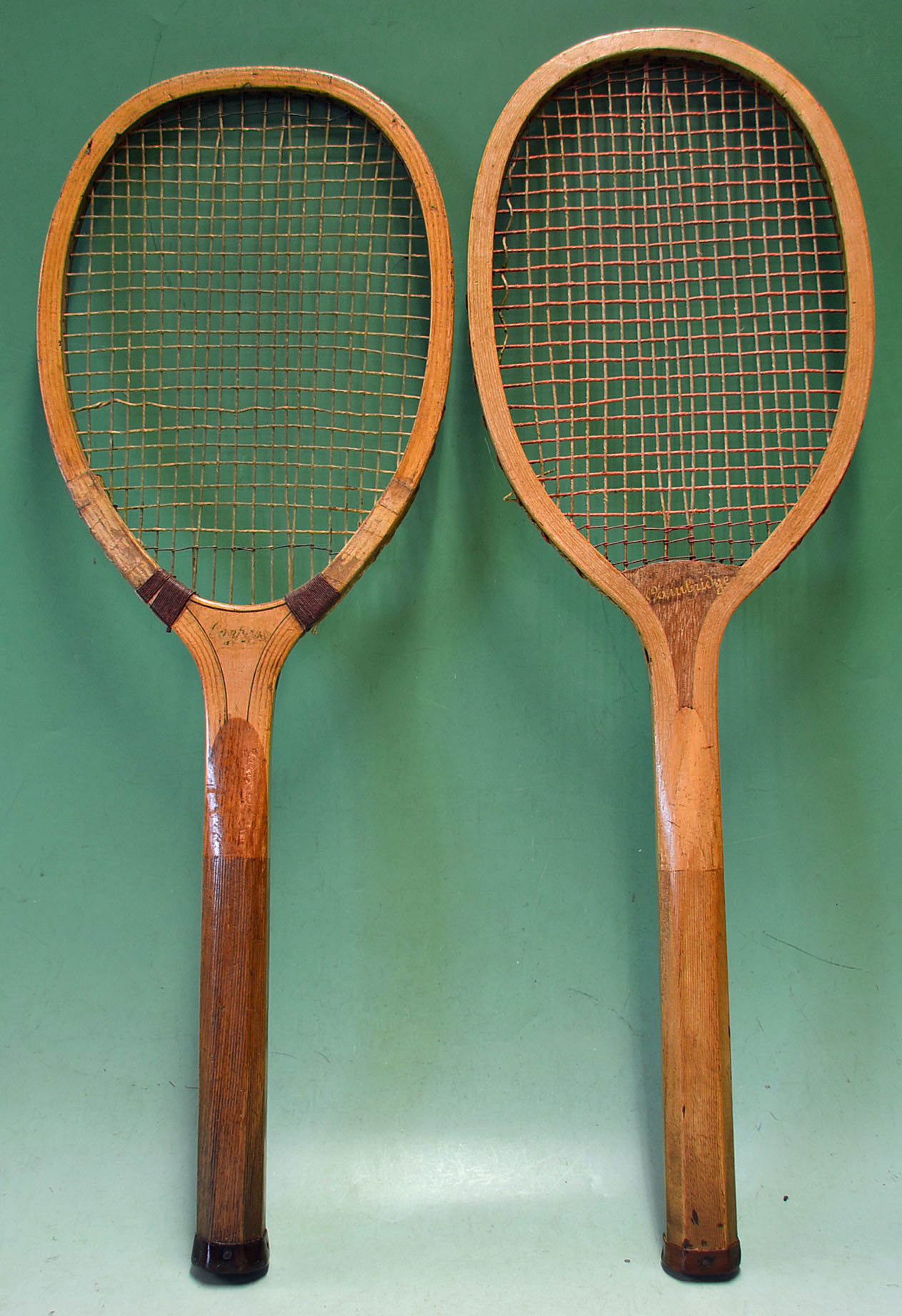 2x Wooden tennis rackets to include a'Cambridge' having a convex wedge^ regular handle^ oval head
