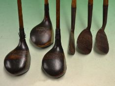 6x Geo Johnson^ West Runton golf clubs including 2x stained persimmon drivers and a stripe topped