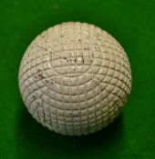 Original c1900 line mesh pattern rubber core golf ball - retaining 95% white paint finish but has