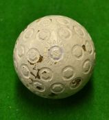 Army and Navy rubber core golf ball with circle and hexagonal patterns^ near mint and unused