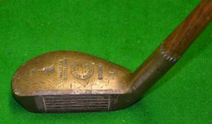 ZOZO small brass mallet head putter with metal face insert showing the Anderson Arrow to the toe and