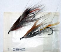 FLIES: (2) Pair of low water steel eye salmon flies on black hooks, each 3" long, appears unused,