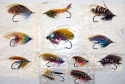 FLIES: (12) Collection of traditionally dressed gut eye salmon flies on black irons, various