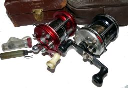 REELS: (2) Abu Ambassadeur 6000 red multiplier reel, grooved 4 screw end plate, level wind, white