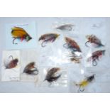 FLIES: (12) Collection of traditionally dressed gut eye salmon flies on black irons, various