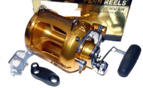 REEL: Penn International 50V SW 2 speed big game reel, lever drag adjuster, rod clamp, gold anodised