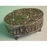 A Victorian Silver Trinket Box of oval form, the hinged lid boldly embossed with birds, trees and