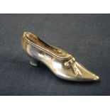 A Silver pin Cushion In the form of a lady's shoe. Birmingham 1904-05. 2 ¾" long