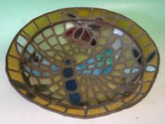 A Stained glass Plafonnier In the style of Tiffany Studios with dragonfly and foliage in colours.