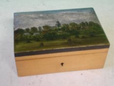 A Boxwood Box The lid painted in oils with a village scene. 5 ½" wide