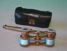A Pair of Opera Glasses Gilt brass and turquoise guilloche enamel with abalone eyepieces. Telescopic