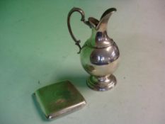 A Silver Cigarette Case Birmingham 1918-19. 3ozs 4dwt, together with a plated ewer. 6 ½" high